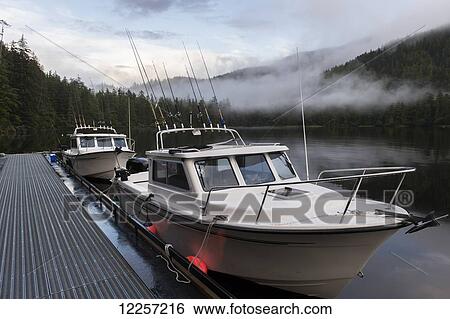 Fishing boats along a dock; Queen Charlotte Islands, British Columbia, Canada View Large Photo Image Stock Photograph - Fishing boats along a dock; Queen Charlotte Islands, British Columbia, Canada. Fotosearch