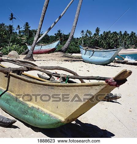 Stock Image - Fishing Boats And Catarmarans, Tangalle Beach. Fotosearch