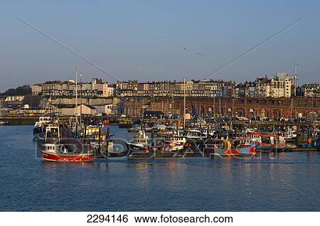 Stock Photograph - Fishing boats at The Royal Harbour and marina; Ramsgate, Thanet, Kent, England. Fotosearch