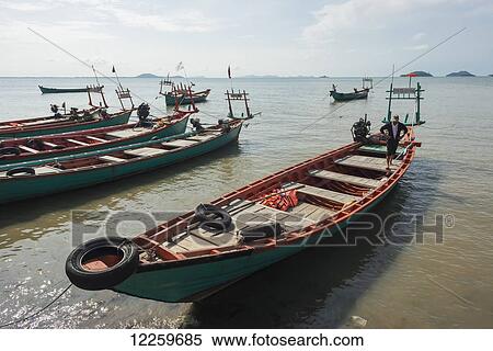 Fishing boats by the local pier; Kep, Cambodia View Large Photo Image Stock Photography - Fishing boats by the local pier; Kep, Cambodia. Fotosearch
