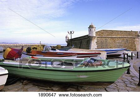 Fishing Boats In Front Of Fort View Large Photo Image Stock Photo - Fishing Boats In Front Of Fort. Fotosearch