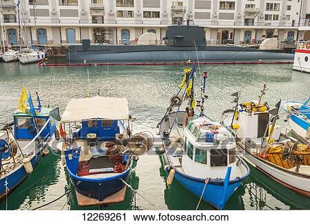 Fishing boats in the harbour; Genoa, Liguria, United States of America View Large Photo Image Stock Image - Fishing boats in the harbour; Genoa, Liguria, United States of America. Fotosearch