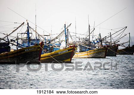Fishing Boats Moored At Town Of Mui Ne, Vietnam View Large Photo Image Picture - Fishing Boats Moored At Town Of Mui Ne, Vietnam. Fotosearch