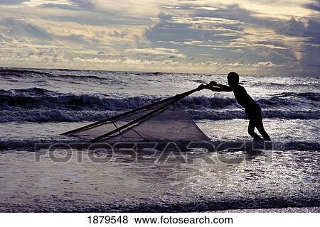 Fishing For Shrimps On The Coast In The Bay Of Bengal View Large Photo Image Stock Photo - Fishing For Shrimps On The Coast In The Bay Of Bengal. Fotosearch
