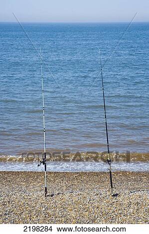 Fishing poles, Weybourne beach, Weybourne, Norfolk, UK View Large Photo Image Picture - Fishing poles, Weybourne beach, Weybourne, Norfolk, UK. Fotosearch