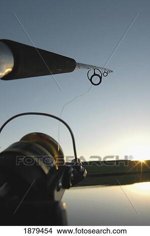 Fishing Rod Casting Over A Pond View Large Photo Image Picture - Fishing Rod Casting Over A Pond. Fotosearch