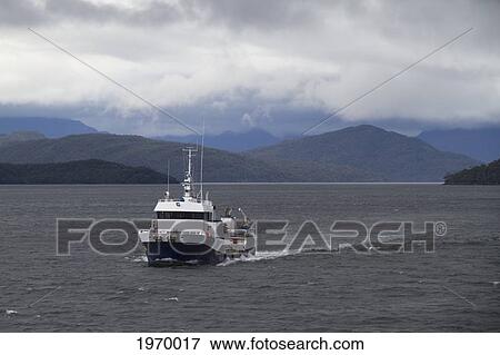 Stock Photo - Fishing Trawler In Canal Moraleda, Aysen Region, Chile. Fotosearch