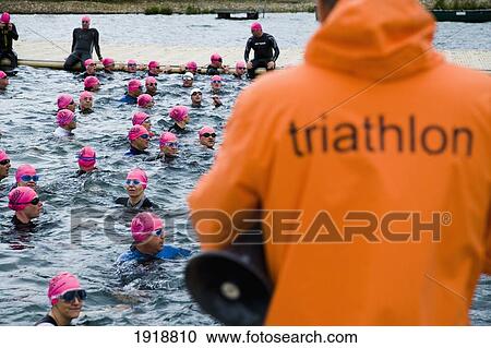 Stock Image - Fitness Competitors In Triathlon. Fotosearch