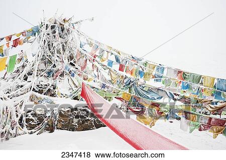 Five-Color Prayer Flags With Mantras At The Snowed In High Mountain Pass, Tibet Stupa; Tibet, Sichuan, China View Large Photo Image Stock Photo - Five-Color Prayer Flags With Mantras At The Snowed In High Mountain Pass, Tibet Stupa; Tibet, Sichuan, China. Fotosearch