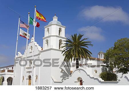 Flags At San Luis Rey Mission Church; Oceanside, California, United States Of America View Large Photo Image Stock Photo - Flags At San Luis Rey Mission Church; Oceanside, California, United States Of America. Fotosearch
