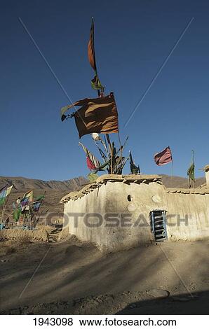 Stock Photo - Flags Fluttering In The Wind Over The Shrine Of Khoja Mohammad Baba Near Jalrez, Vardak Province, Afghanistan. Fotosearch
