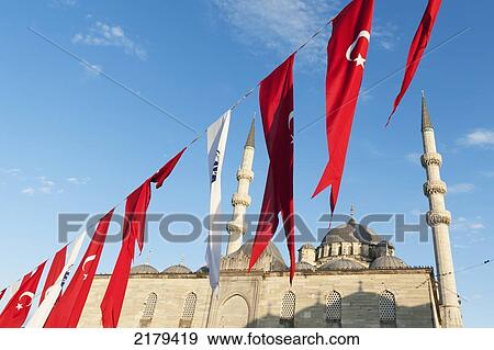 Stock Photo - Flags Flying In Front Of The New Mosque; Istanbul Turkey. Fotosearch