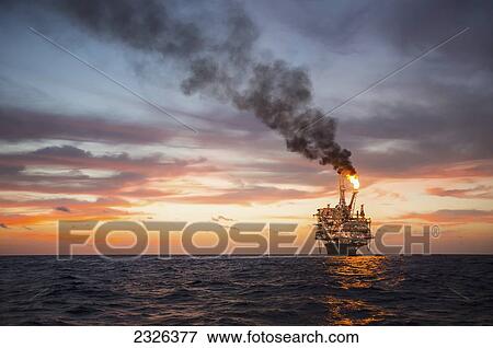 Flame coming off perdido oil rig in gulf of mexico; Corpus christi texas usa View Large Photo Image Stock Photo - Flame coming off perdido oil rig in gulf of mexico; Corpus christi texas usa. Fotosearch