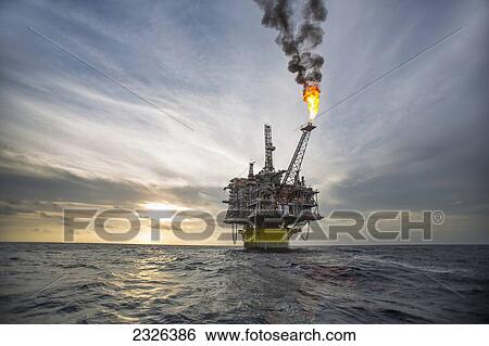 Flame coming off perdido oil rig in gulf of mexico; Corpus christi texas usa View Large Photo Image Stock Photograph - Flame coming off perdido oil rig in gulf of mexico; Corpus christi texas usa. Fotosearch