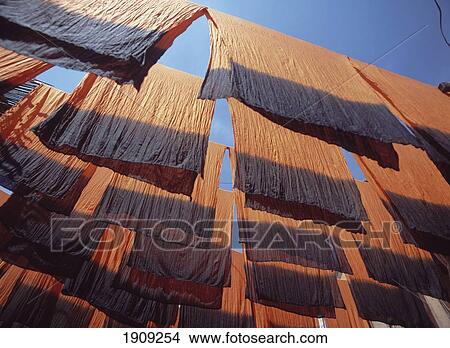 Picture - Fleshly Dyed Cloth Hanging Up In Souks Of Marrakesh, Morocco. Fotosearch