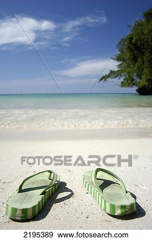 Stock Photo - Flip-Flops On The Beach Of Frenchman's Cove, Jamaica.. Fotosearch