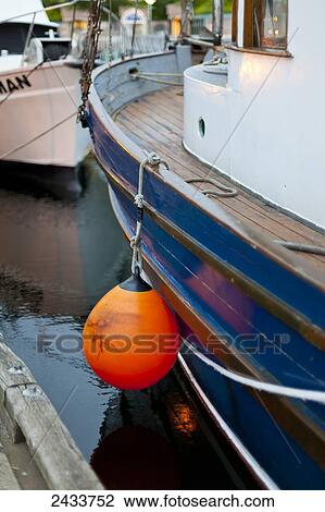 Float on side of boat in Nanaimo Harbour at sunrise; Nanaimo, British Columbia, Canada View Large Photo Image Stock Image - Float on side of boat in Nanaimo Harbour at sunrise; Nanaimo, British Columbia, Canada. Fotosearch
