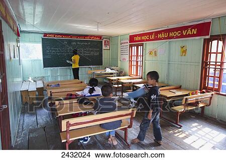 Picture - Floating classroom in Vung Vieng Fishing Village in Bai Tu Long Bay, Halong Bay; Vietnam. Fotosearch
