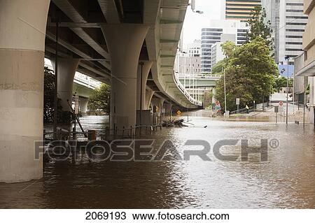 Stock Image - Flooding In An Urban Area; Brisbane Queensland Australia. Fotosearch