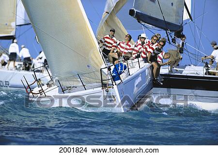 Florida, Key West Race Week, Bow Of Yacht With Crew On Rail Boats In Background View Large Photo Image Picture - Florida, Key West Race Week, Bow Of Yacht With Crew On Rail Boats In Background. Fotosearch