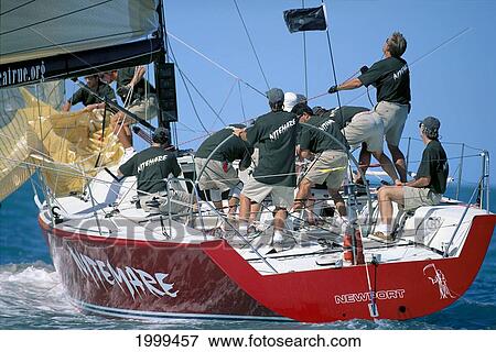 Stock Photo - Florida, Key West Race Week, Close-Up View Of The 'nitemare' And Her Crew, Red Hull. Fotosearch