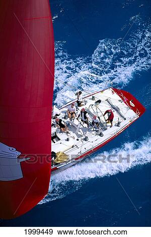Florida, Miami, Short Ocean Racing Championship (Sorc), Close-Up Top View Of Crew, Yacht With Red Sail View Large Photo Image Stock Photo - Florida, Miami, Short Ocean Racing Championship (Sorc), Close-Up Top View Of Crew, Yacht With Red Sail. Fotosearch