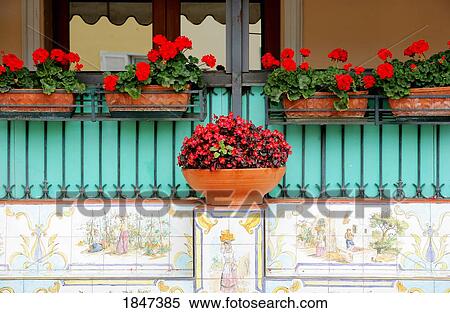 Stock Photography - Flowering Baskets On Window Ledge; Capri, Italy. Fotosearch