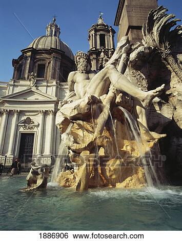 Fontana Quatro Fiumi And Sant Agnese, Agone Church, Piazza Navona View Large Photo Image Stock Photograph - Fontana Quatro Fiumi And Sant Agnese, Agone Church, Piazza Navona. Fotosearch
