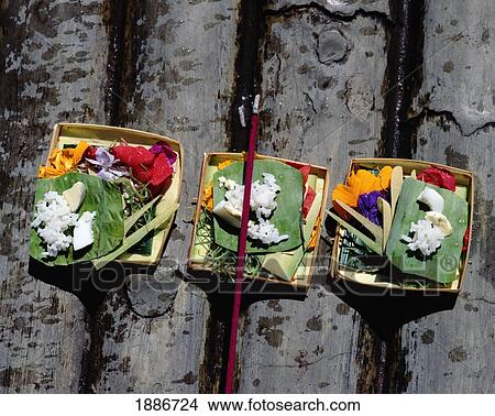Food, Flower, Incense Offering In Ubud, Bali View Large Photo Image Picture - Food, Flower, Incense Offering In Ubud, Bali. Fotosearch