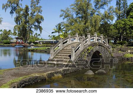 Footbridge over Waihonu Pond in Liliuokalani Gardens; Hilo, Island of Hawaii, Hawaii, United States of America View Large Photo Image Stock Photography - Footbridge over Waihonu Pond in Liliuokalani Gardens; Hilo, Island of Hawaii, Hawaii, United States of America. Fotosearch
