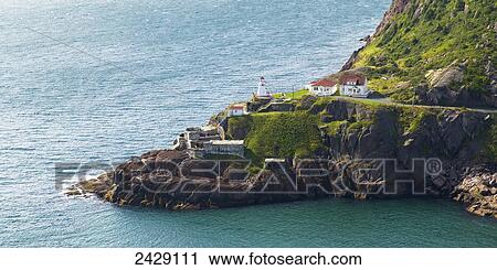 Stock Image - Fort Amherst Lighthouse on the Atlantic coast; St. John's, Newfoundland, Canada. Fotosearch