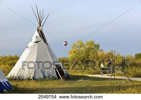 Fort Whyte Centre For Environmental Education With A Hot Air Balloon In Background, Winnipeg, Manitoba View Large Photo Image Picture - Fort Whyte Centre For Environmental Education With A Hot Air Balloon In Background, Winnipeg, Manitoba. Fotosearch