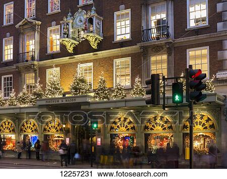 Stock Image - Fortnum and Mason clock; London, England. Fotosearch