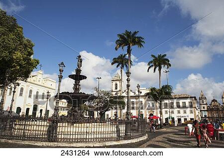 Picture - Fountain and historical buildings on the Terreiro de Jesus, in the UNESCO protected historical centre; Salvador, Brazil. Fotosearch