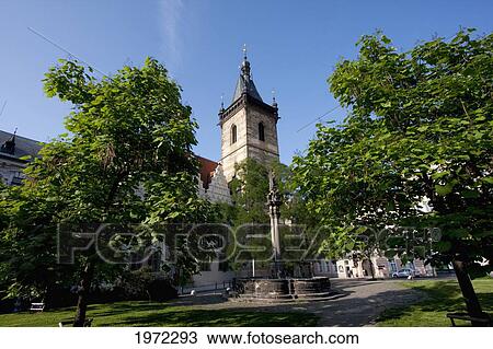 Stock Image - Fountain And New Town Hall In Charles Square, Prague, Czech Republic. Fotosearch