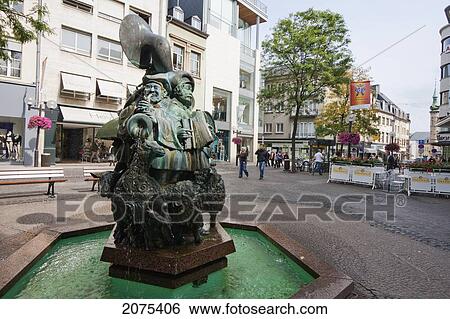 Stock Photograph - Fountain Featuring Musicians And Sheep On Avenue Monterey, Luxembourg. Fotosearch