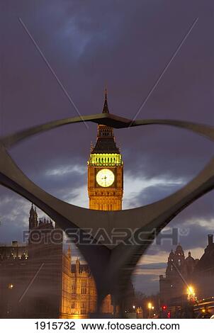 Stock Image - Fountain Sculpture And Big Ben At Sunset. Fotosearch