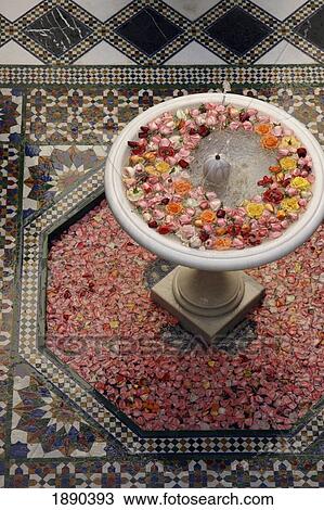 Stock Image - Fountain With Rose Heads In Riad Al Moussika, Pasha's Residence. Fotosearch