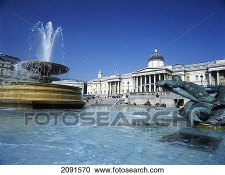 Fountains In Trafalgar Square Looking Across To The National Portrait Gallery, London, Uk. View Large Photo Image Stock Image - Fountains In Trafalgar Square Looking Across To The National Portrait Gallery, London, Uk.. Fotosearch