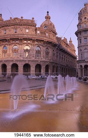 Stock Photography - Fountains Spraying Water Outside Of Buildings; Genoa Liguria Italy. Fotosearch