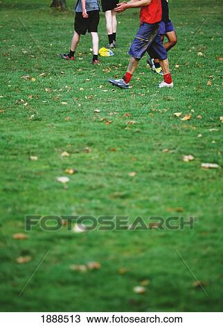 Four Kids Playing Football In Hyde Park View Large Photo Image Stock Image - Four Kids Playing Football In Hyde Park. Fotosearch