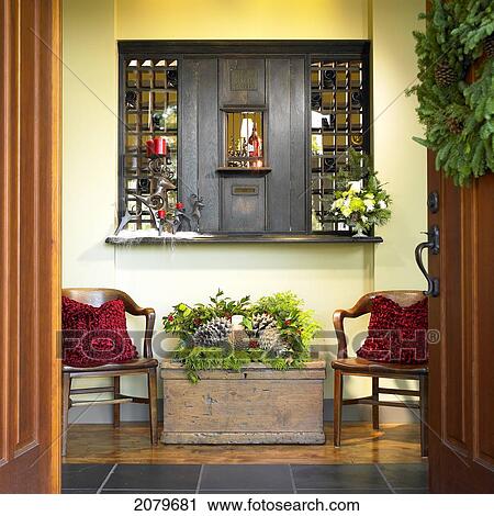 Foyer Of House With 2 Chairs And Chest, Decorated For Christmas With Holly And Pine. View Large Photo Image Stock Image - Foyer Of House With 2 Chairs And Chest, Decorated For Christmas With Holly And Pine.. Fotosearch