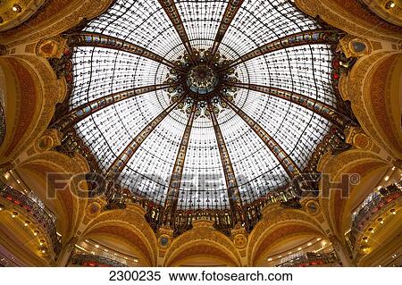 Stock Photography - France, Boulevard Haussmann; Paris, Grand interior dome of Galeries Lafayette department store. Fotosearch