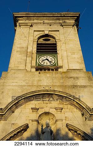 Picture - France, Clock Tower at Saint Martin-de-Re on Ile de Re; Poitou-Charentes. Fotosearch