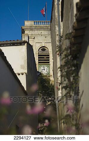 France, Clock Tower at Saint Martin-de-Re on Ile de Re; Poitou-Charentes View Large Photo Image Stock Photo - France, Clock Tower at Saint Martin-de-Re on Ile de Re; Poitou-Charentes. Fotosearch