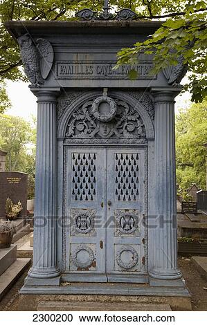 Stock Image - France, Detail of tomb in Montmartre cemetery; Paris. Fotosearch