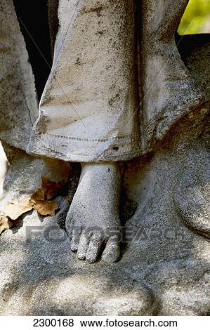 Stock Photo - France, Detail of tomb in Pere le Chaise Cemetery; Paris. Fotosearch