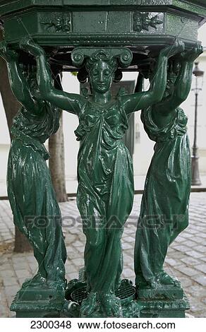 Stock Photo - France, Detail of Wallace Fountain; Paris. Fotosearch