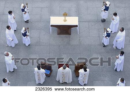 Stock Photography - France, Hautes-Pyrenees, Prayers at the Sanctuary of our lady of Lourdes; Lourdes. Fotosearch