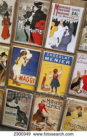 Stock Photo - France, Montmartre; Paris, Art stall with vintage poster reproduction. Fotosearch